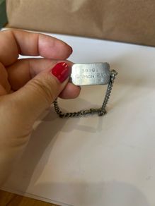 An antique solid silver ID bracelet WWII