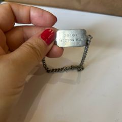 An antique solid silver ID bracelet WWII