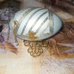 Beautiful Turquoise Hinged Egg Jewelry Box, 4 petal opening Gold Tone filigree borders on stand,