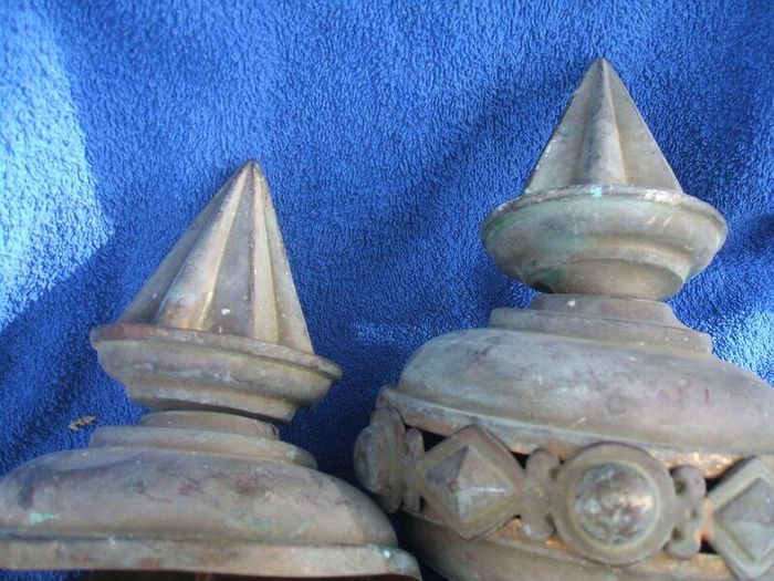 Two antique copper metal finials