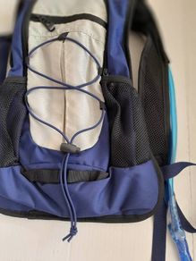 new navy hydrational bag pack tag attached