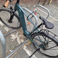 Decathlon Rockrider E-ACTV 500 electric hybrid bike featuring a mid-drive moto