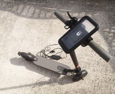 Folding e-scooter with phone holder & charger