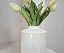 Faux tulips and vase