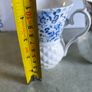 Set of 2 mugs decorative porcelain  fine bone china featuring a distinct textured, quilted or honeycomb base and intricate floral patterns. Image 3