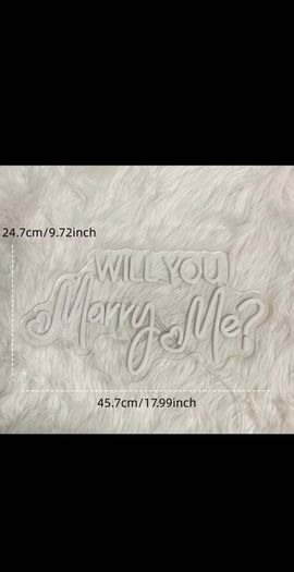 neon sign 'will you marry me?'