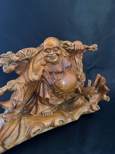 Vintage Maitreya Buddha figure carrying money bag