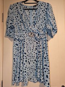 beautiful belted animal print  midi dress from Girl in Mind