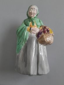 FIGURINE  - Old Lady - Carrying a Basket of Fruit