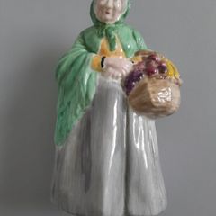 FIGURINE  - Old Lady - Carrying a Basket of Fruit