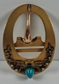 Antique gold tone belt buckle