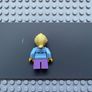 lego holiday hol111 Girl minifigure - Fair Isle Sweater, Bright Light Yellow Ponytail, Lavender Legs Short, Freckles Image 2