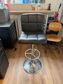 black faux leather bar stool