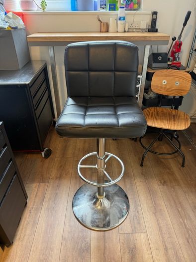 black faux leather bar stool
