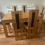 solid oak table and 6 chairs. Image 2