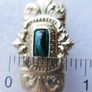 Vintage gold tone brooch with Green Faceted Stone Image 6