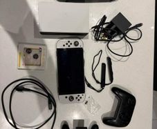 Nintendo Switch Oled include 4 Games,  Pro Controller