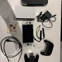 Nintendo Switch Oled include 4 Games,  Pro Controller
