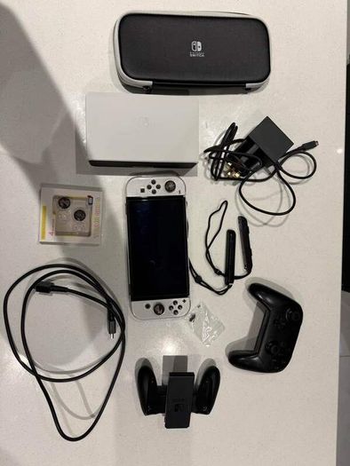 Nintendo Switch Oled include 4 Games,  Pro Controller