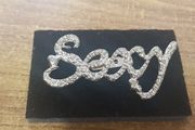 "Sexy" brooch
