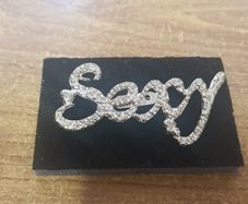 "Sexy" brooch