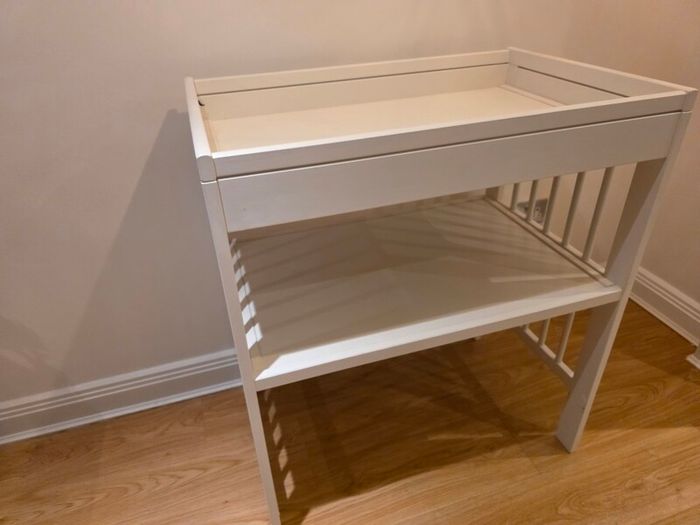 sleigh-style  baby crib and changing table