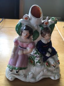 Staffordshire figurine of sleeping couple - spill vase