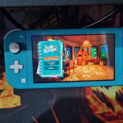 Nintendo switch light like new condition in perfect working order no charger comes with it only cable and two games without boxes thanks for looking