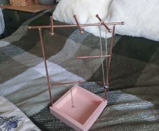 pink and gold jewellery holder