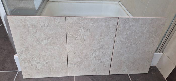 Beige stone-effect ceramic wall tiles