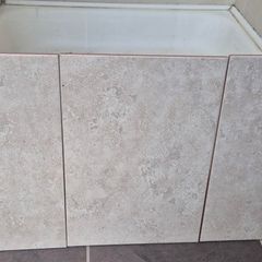 Beige stone-effect ceramic wall tiles
