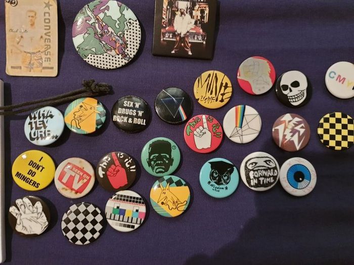pins badges keychains