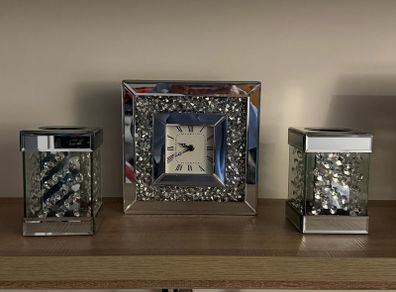 Silver clock and candle holders