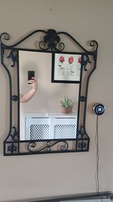 black iron mirrors and table