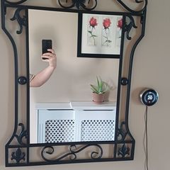 black iron mirrors and table