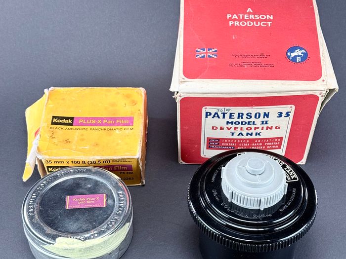 Kodak Plus-X Pan Panchromatic 100ft 35mm film and developing tank