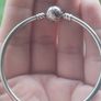 Pandora Moments 925 sterling silver bangle bracelet with a ball clasp. Image 2