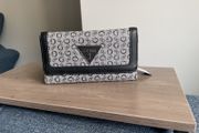 Guess purse. Never used but slightly worn due to storage.