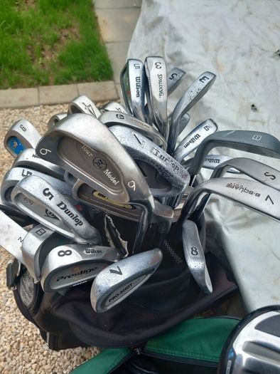 A selection of golf clubs and bags. NOT SELLING SEPARATE
