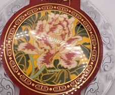 Vintage Chinese fabric in a glass plate