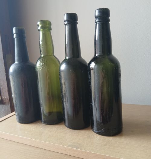 Lot of 4 vintage Guinness bottles