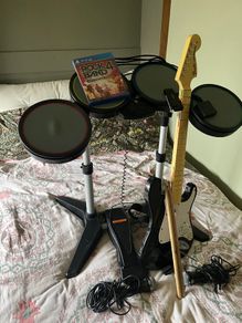 Rock Band 4 PS4 Bundle: Drums, Fender Guitar, 2 Mics, Dongle