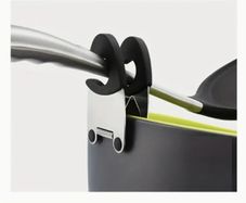 Clip on wooden spoon holder