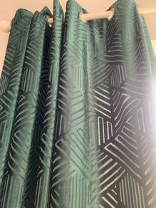 Green velvet eyelet curtains