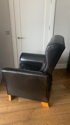 Bespoke solid armchair in need of repair