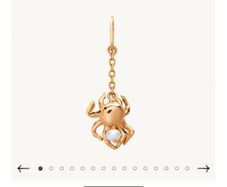 14k solid yellow gold and pearl spider charm from the jewelry brand CATBIRD NYC