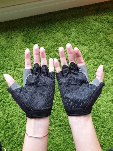 Gym gloves. Fingerless gloves. Cycling gloves. Work gloves. Carpenter gloves. Weightlifting. Workout.  Fitness.  Bodybuilding