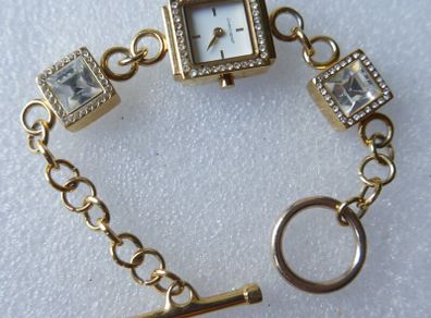 Pieces gold tone bracelet watch with crystal detail