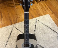 Acoustic Guitar + case + tuner + attached pick holder