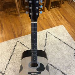 Acoustic Guitar + case + tuner + attached pick holder